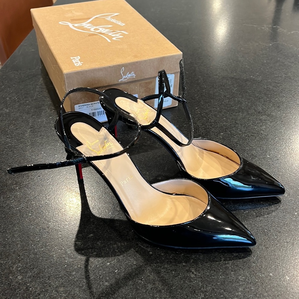 Christian Louboutin black patent pumps